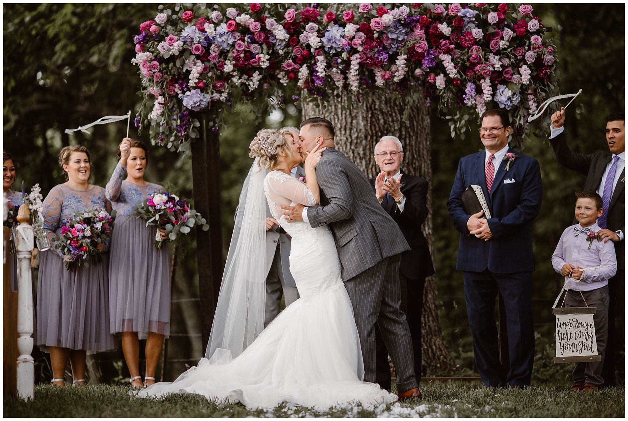 First kiss at wedding at Heartland Meadows