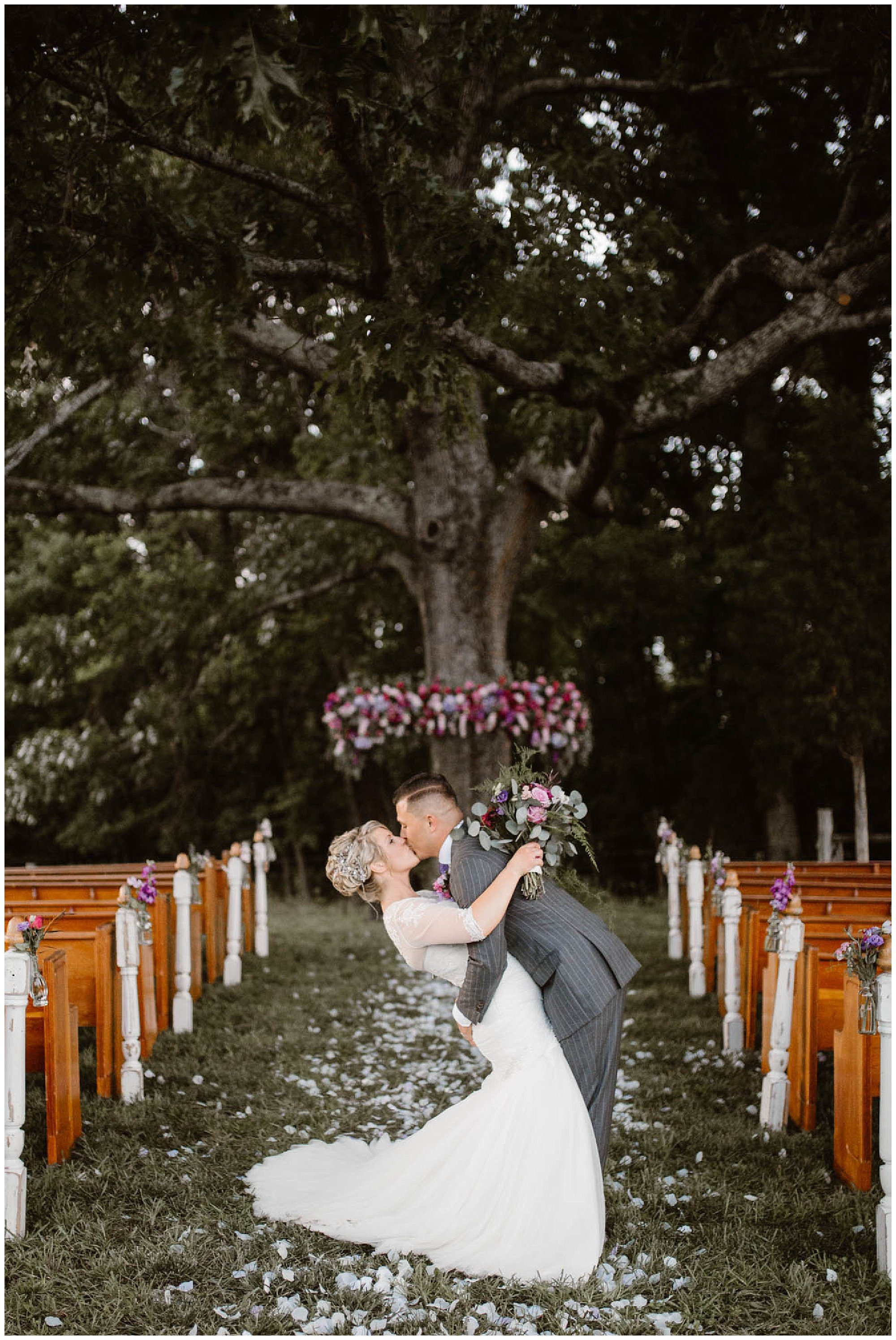 Bride and Groom kissing at Heartland Meadows