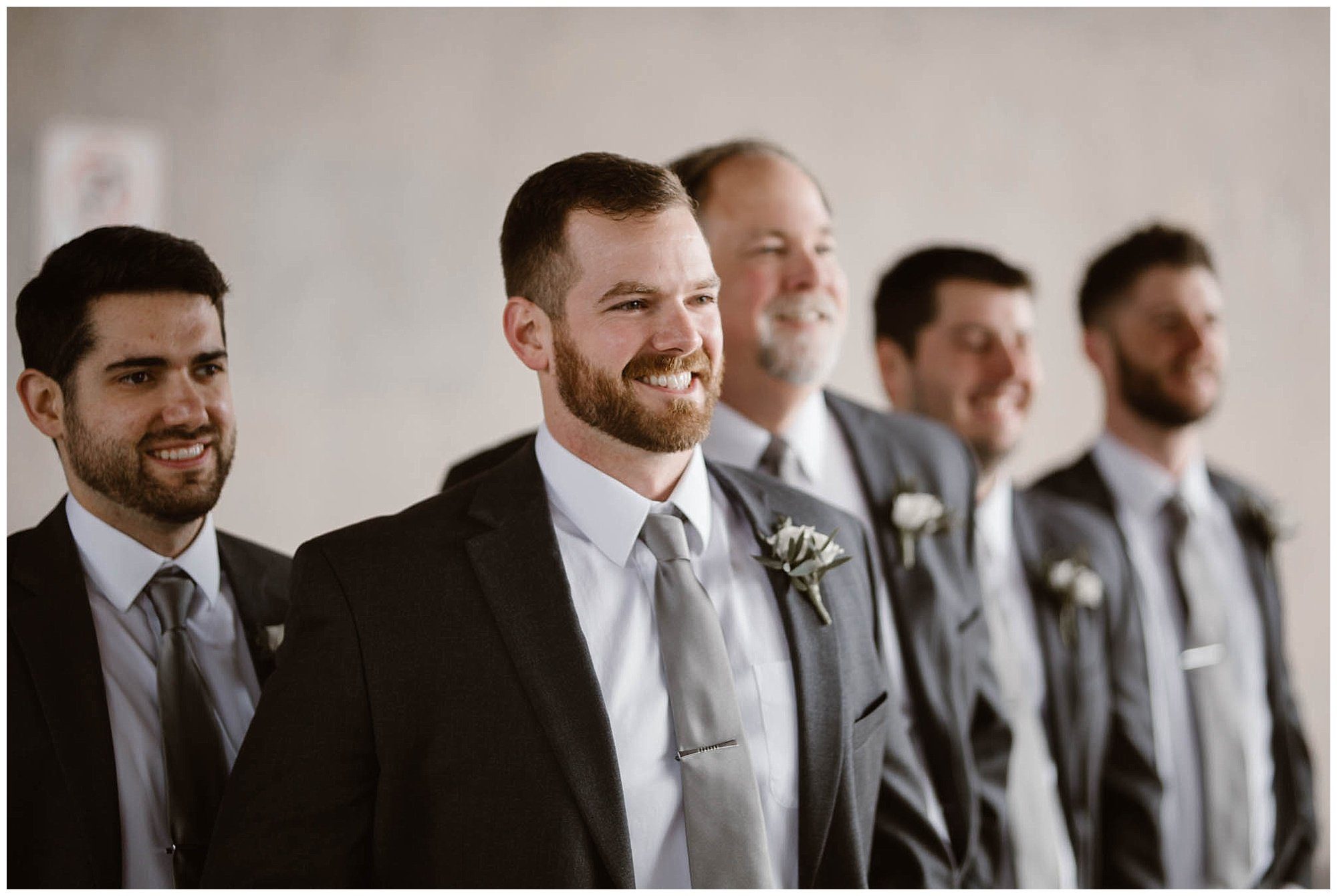 Photo of groom with groomsmen