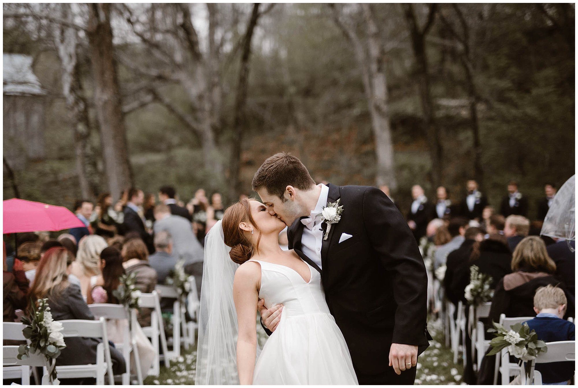 Bride and Groom kissing on wedding day at Dara's Garden