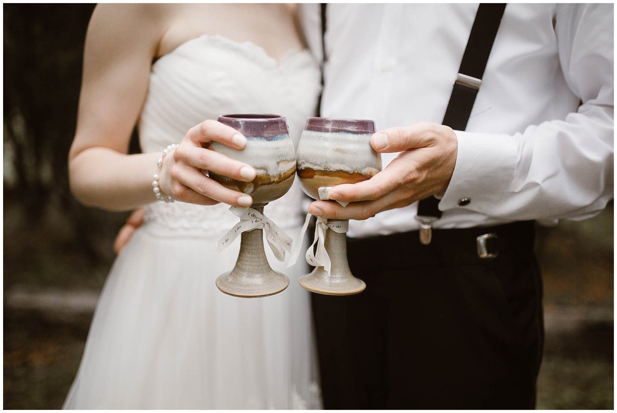 Bride and groom drinking cups