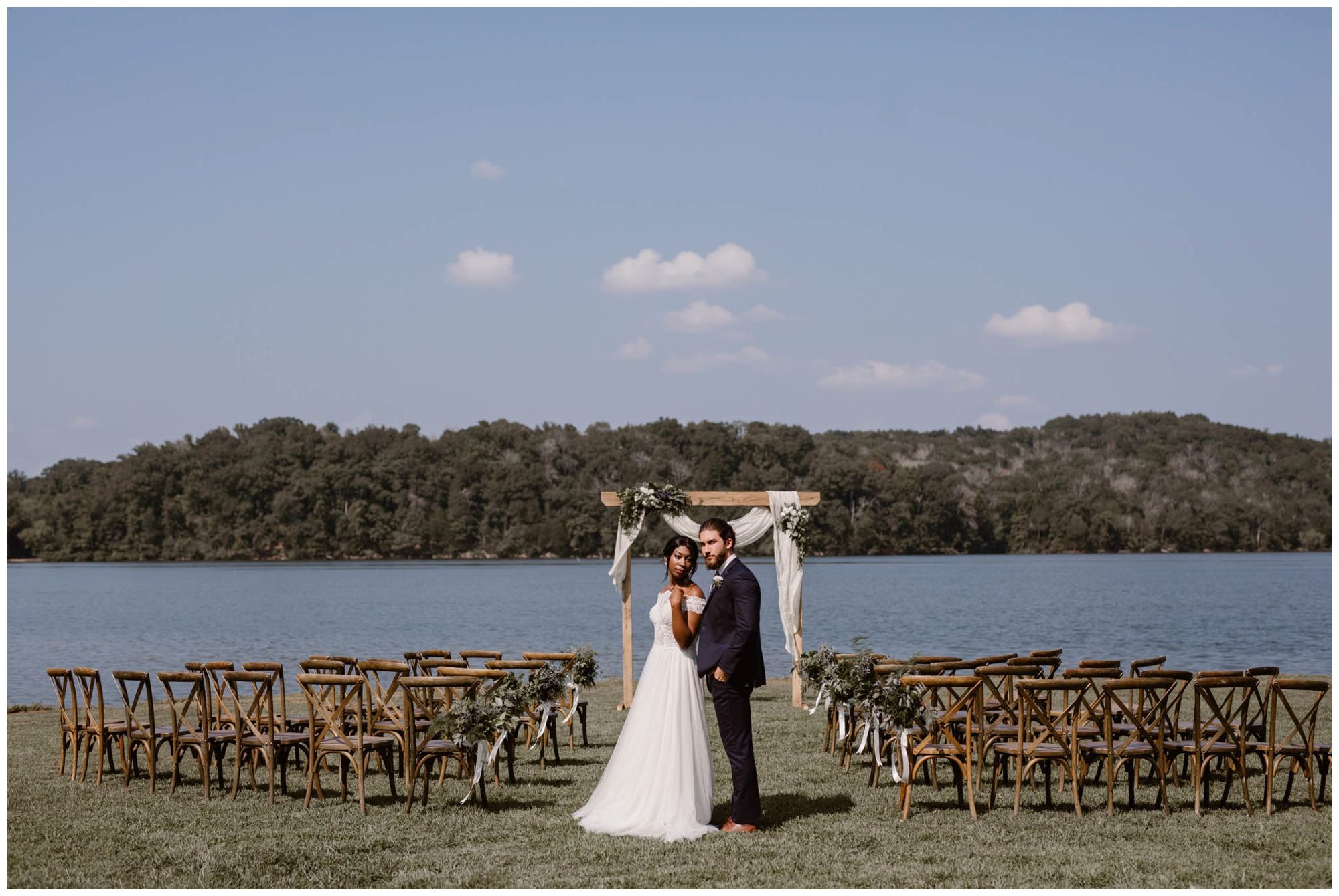 Bride and groom standing at end of aisle during Watts Bar Lake Ceremony
