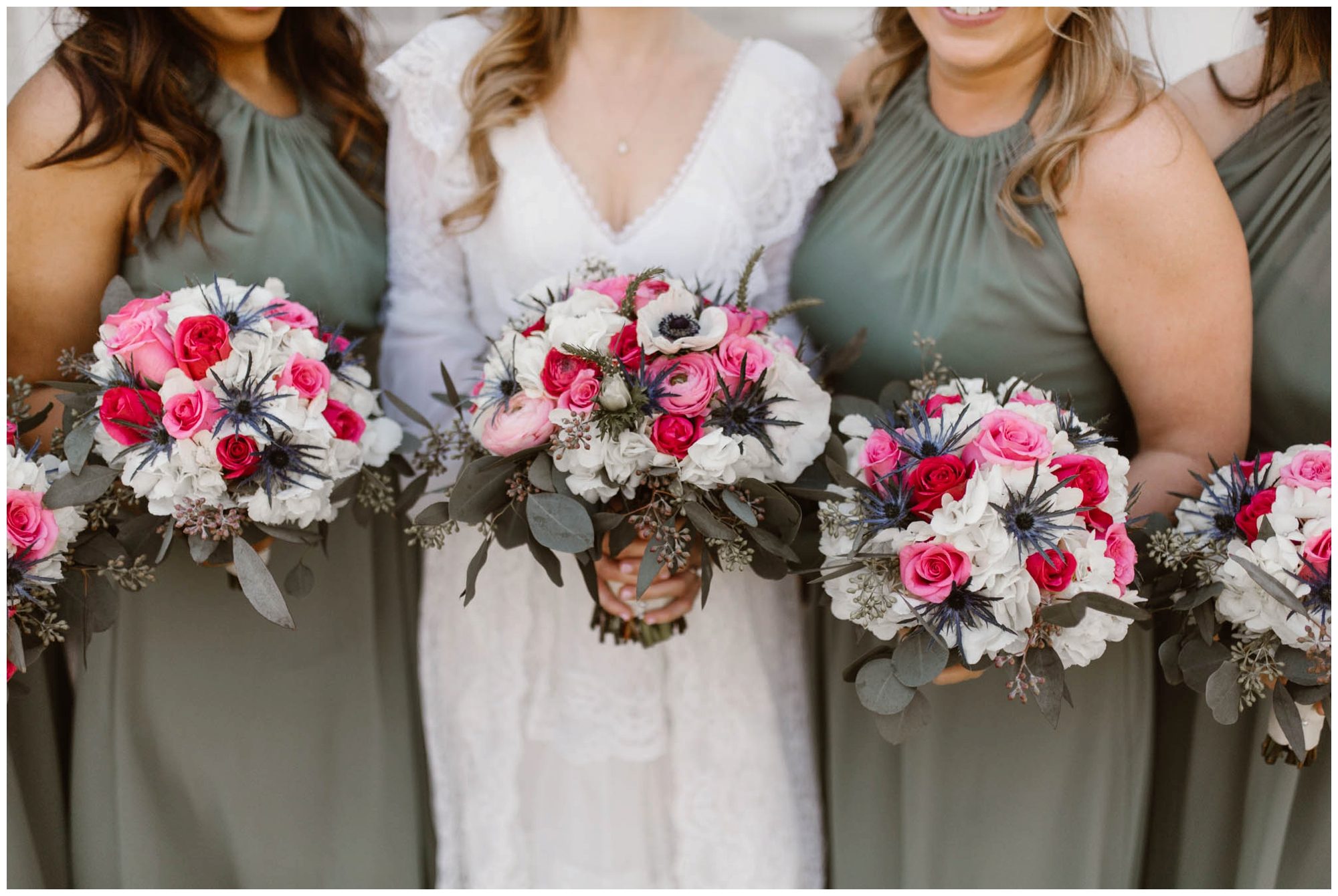 bride and bridesmaids holding white and pink bouquet from Lisa Foster Floral Design