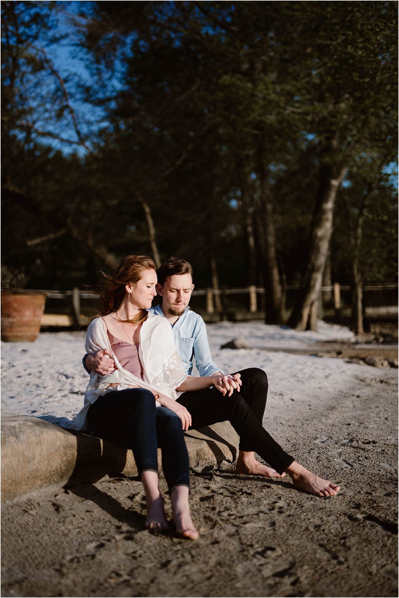 man and woman sitting on beach in Knoxville