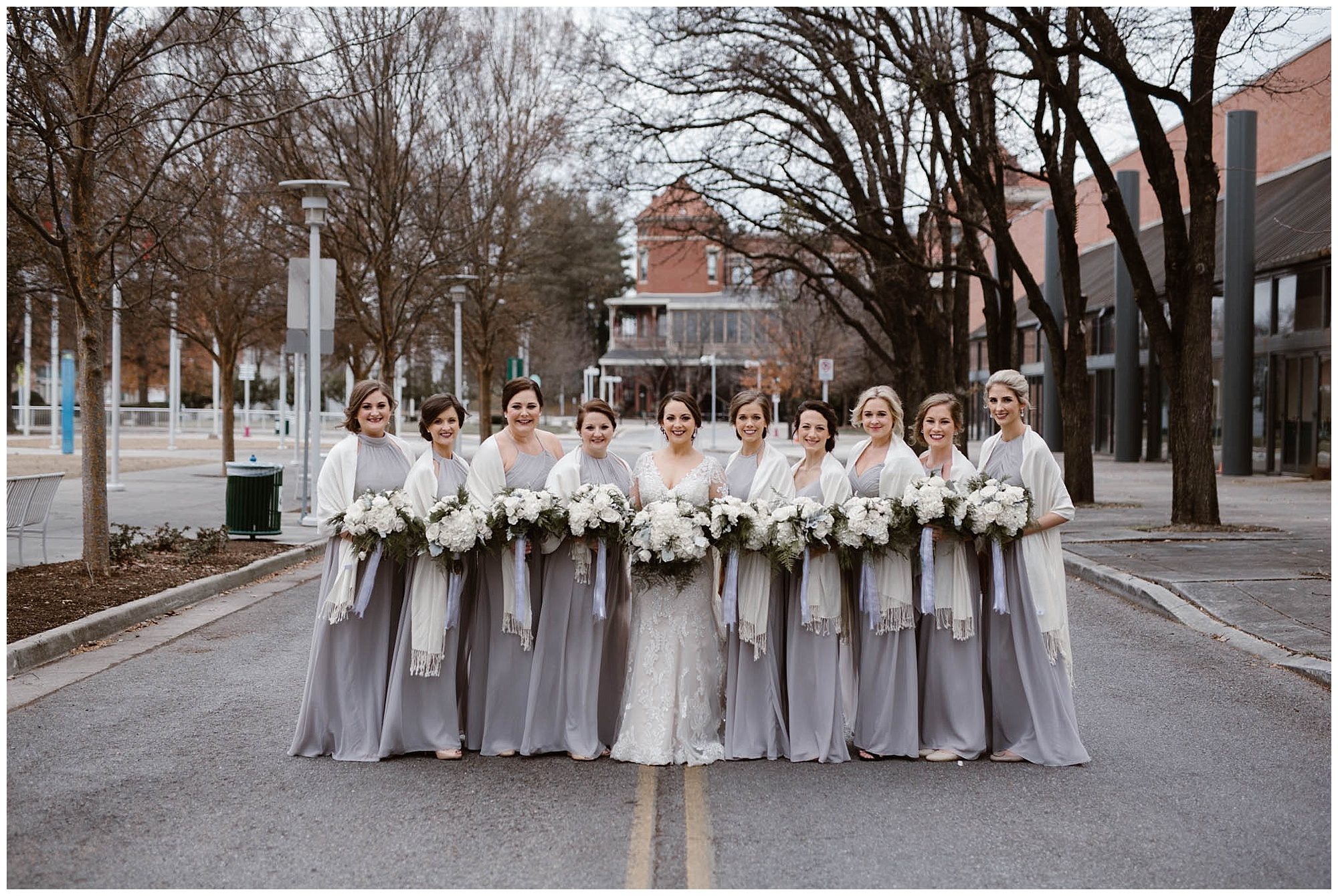 bride and bridesmaid photos on street in Knoxville