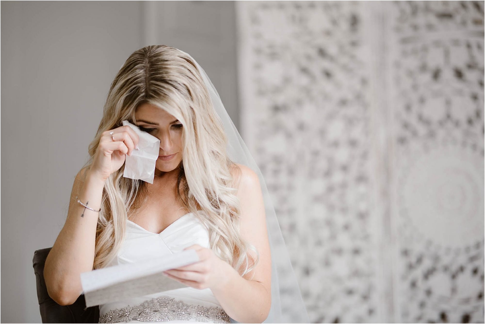 bride crying while reading vows