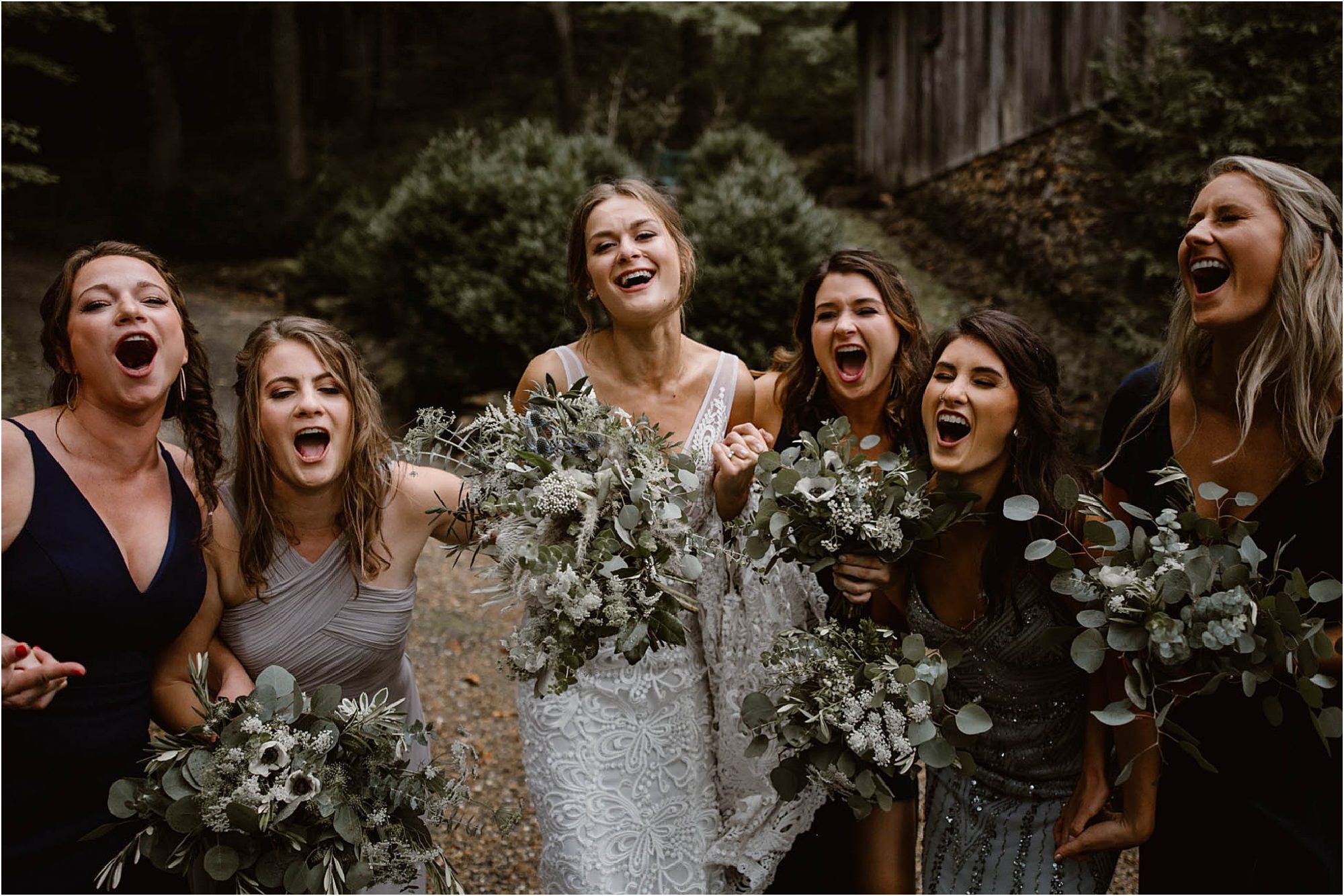 bridesmaids and bride singing on wedding day