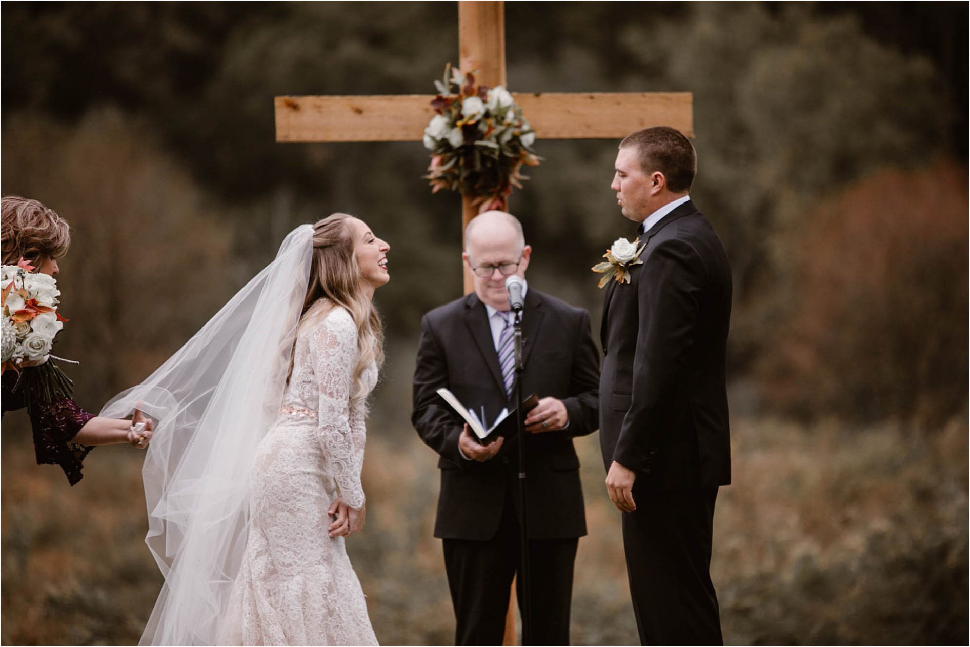 bride and groom laugh at Fall Wedding Ceremony