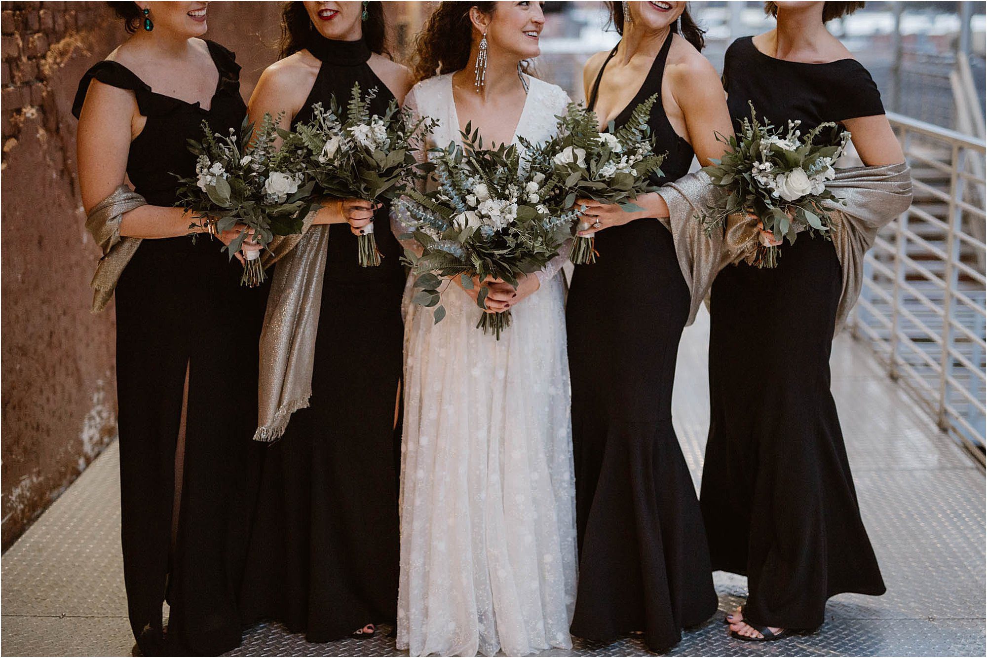 bridesmaids and bride holding bouquets