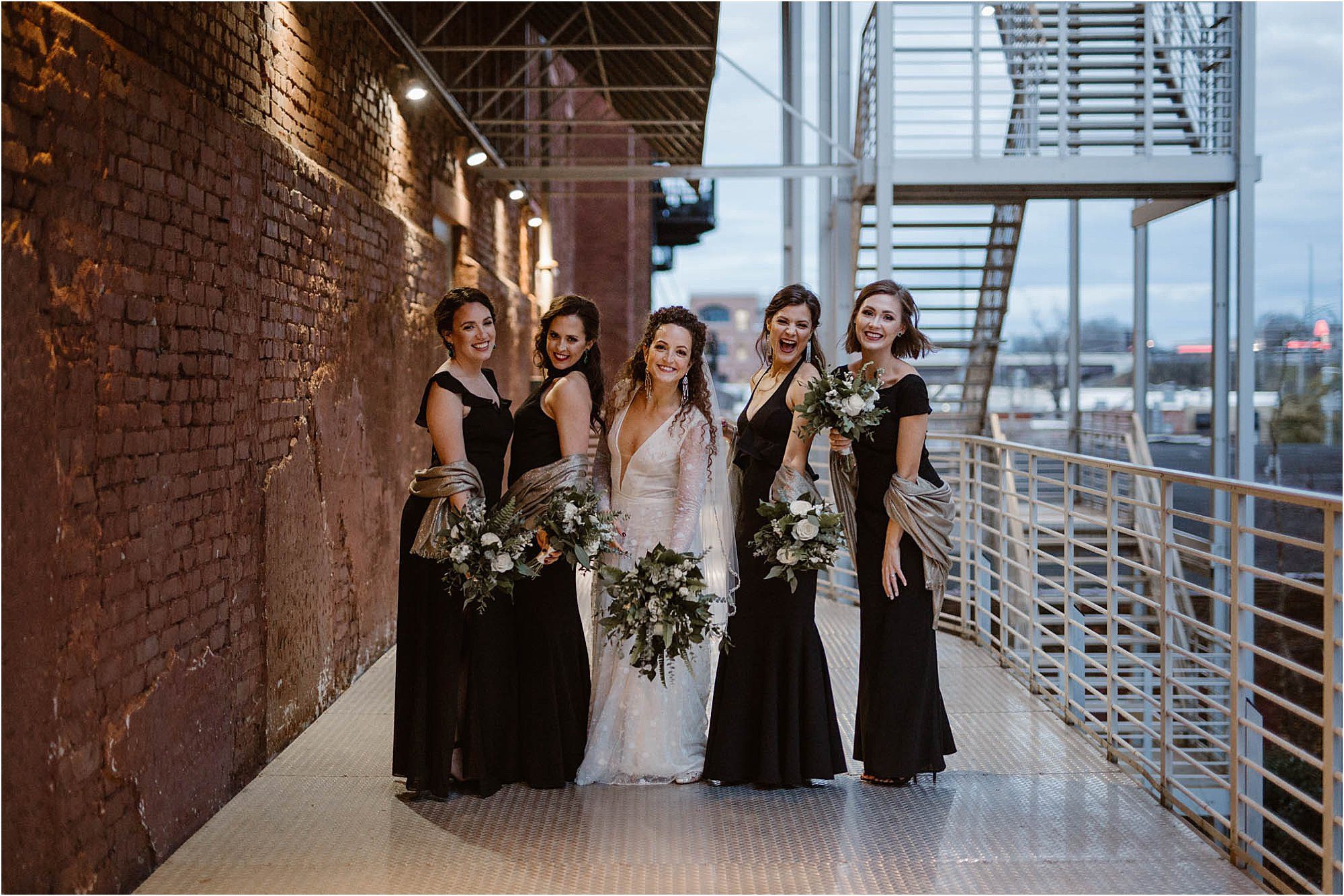 bridesmaid photos under stairwell