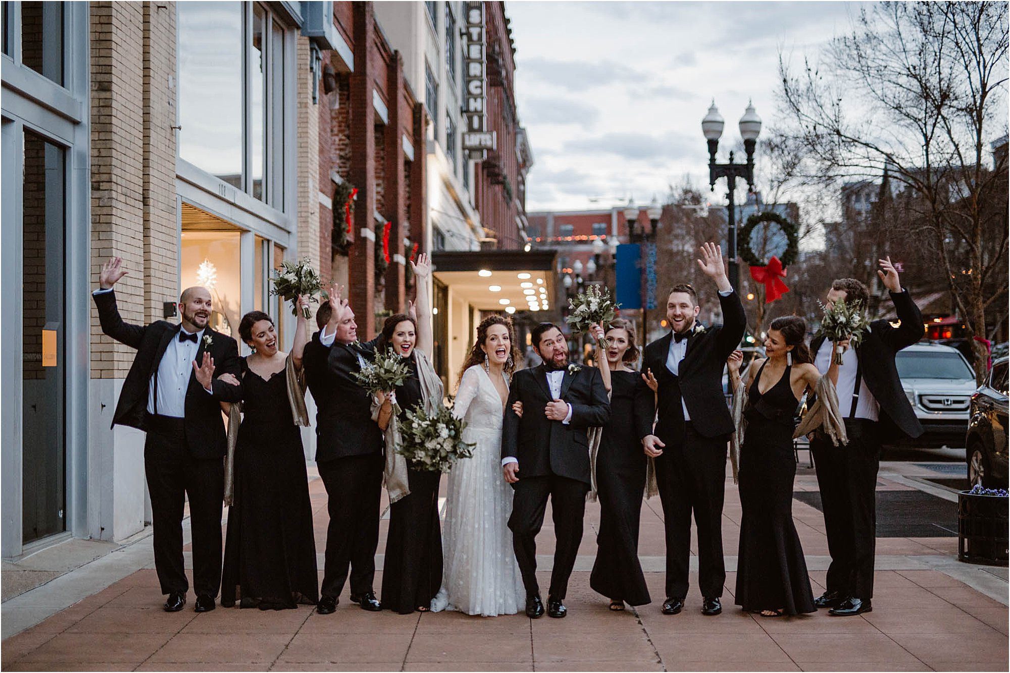 bridal party photos on downtown street