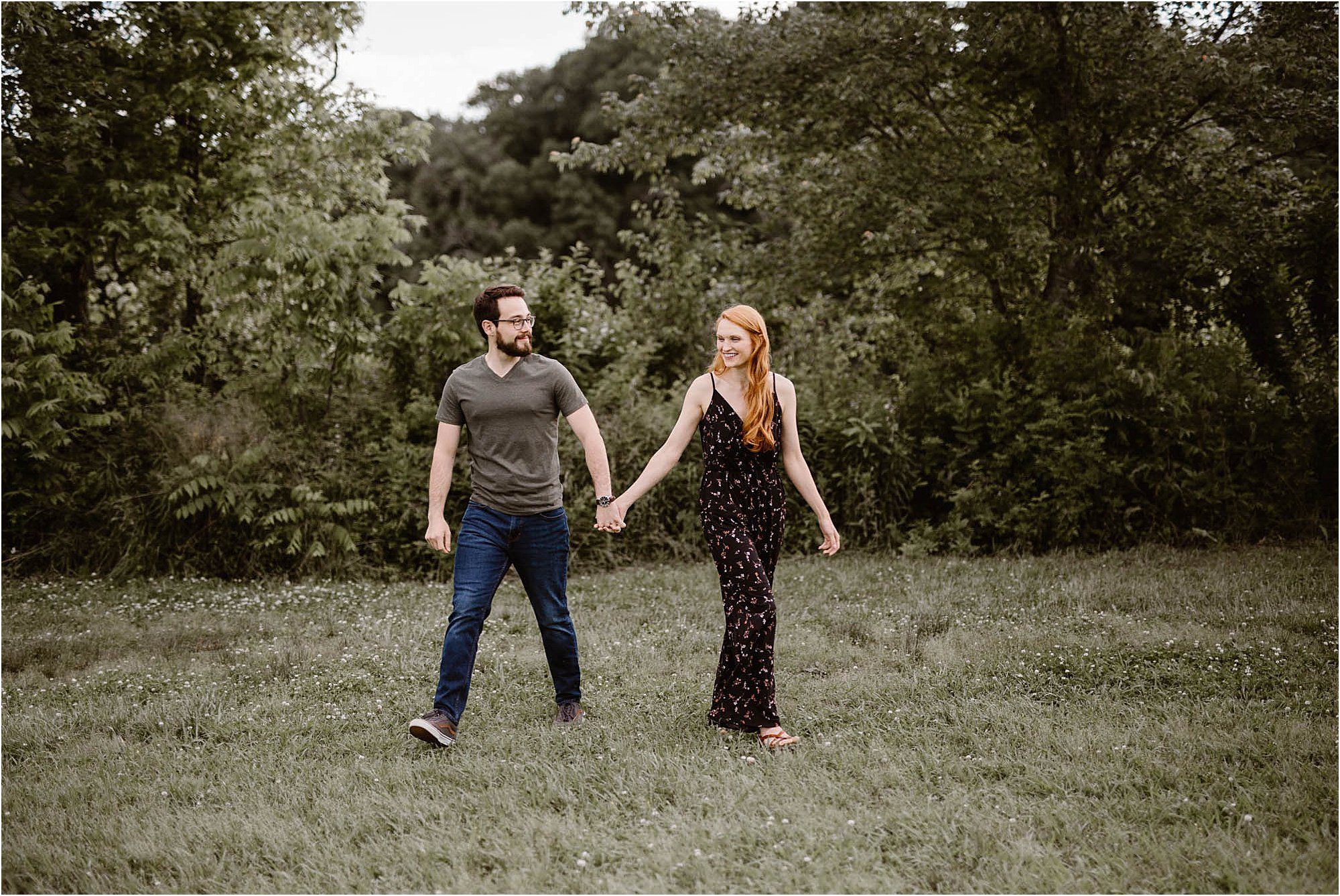 man and woman walking at Sequoyah Park