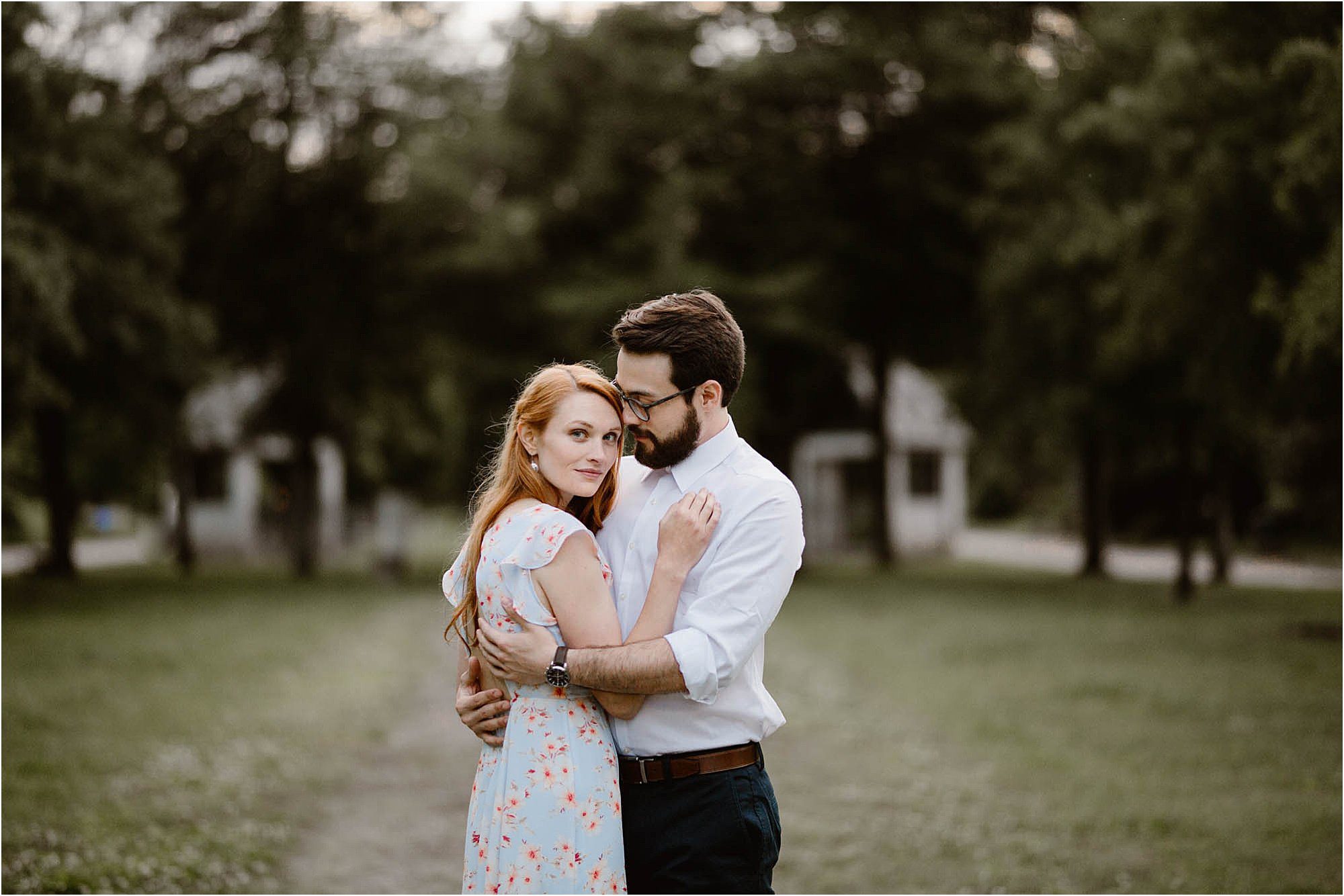 man and woman hugging at engagement session
