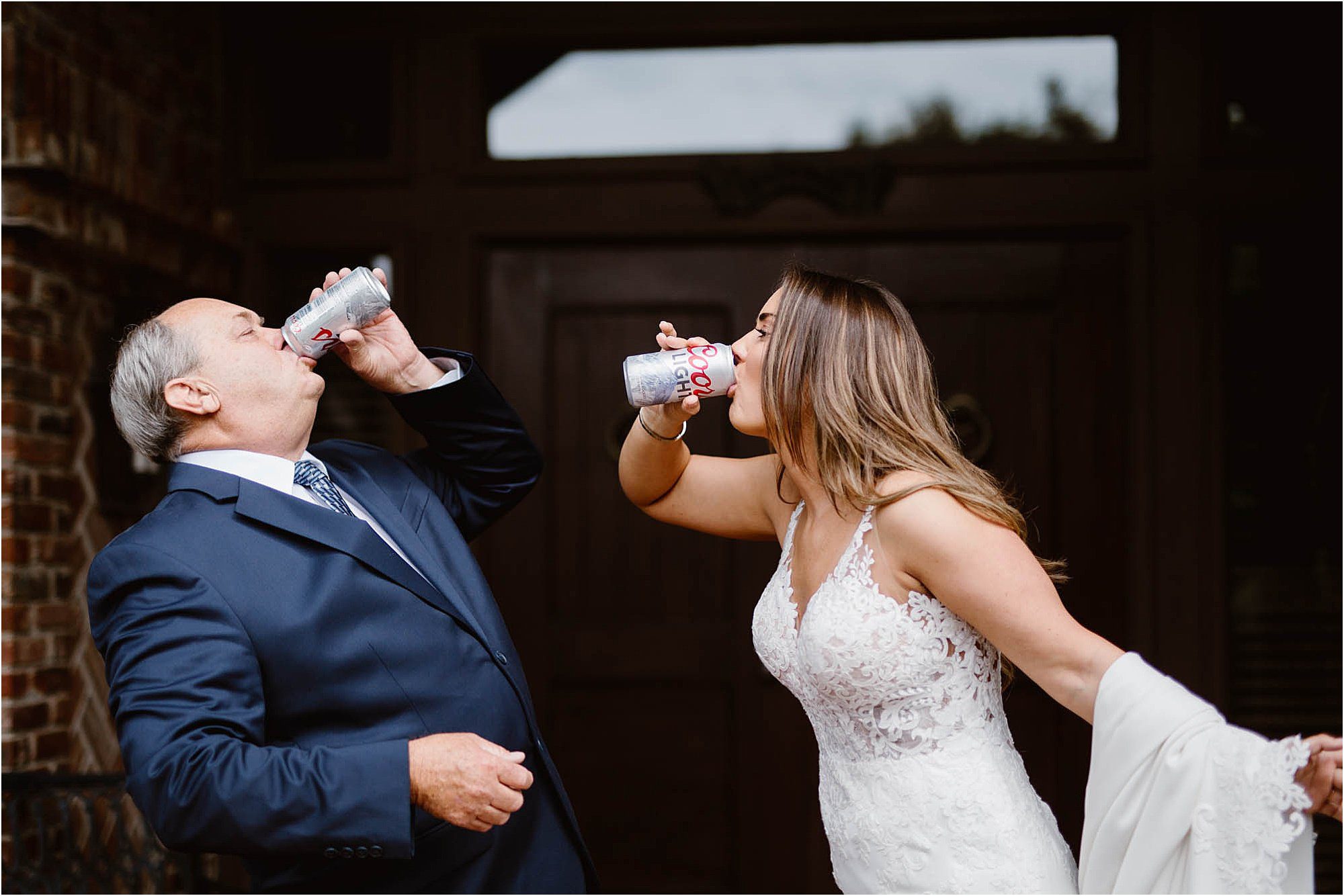 bride and father cheers with Coors