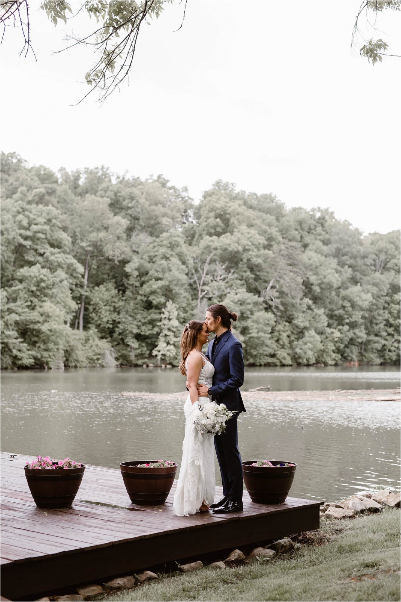 bride and groom portraits on boat dock