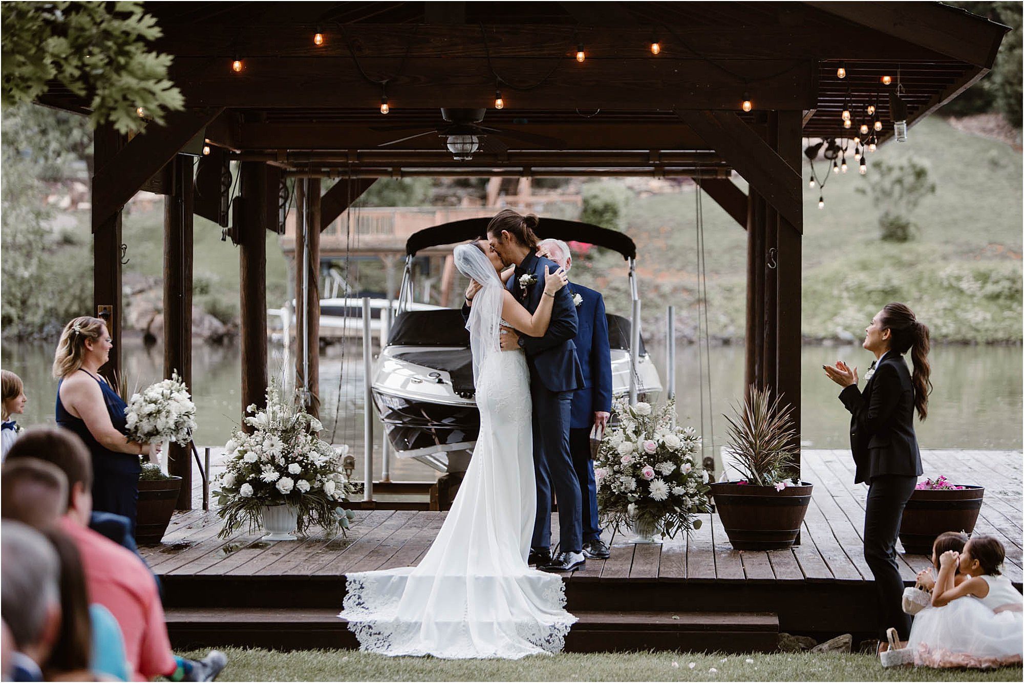 first kiss at a backyard wedding ceremony