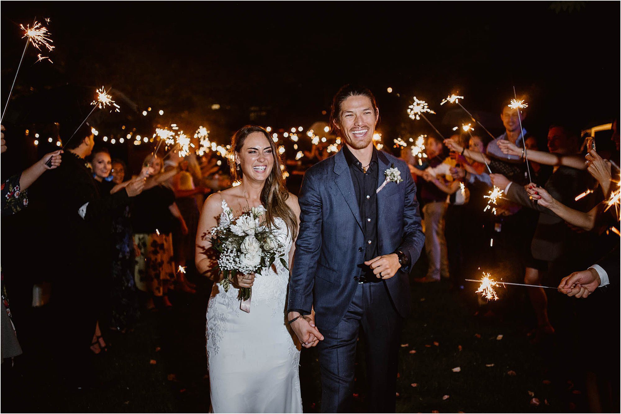 backyard wedding ceremony sparkler exit photos