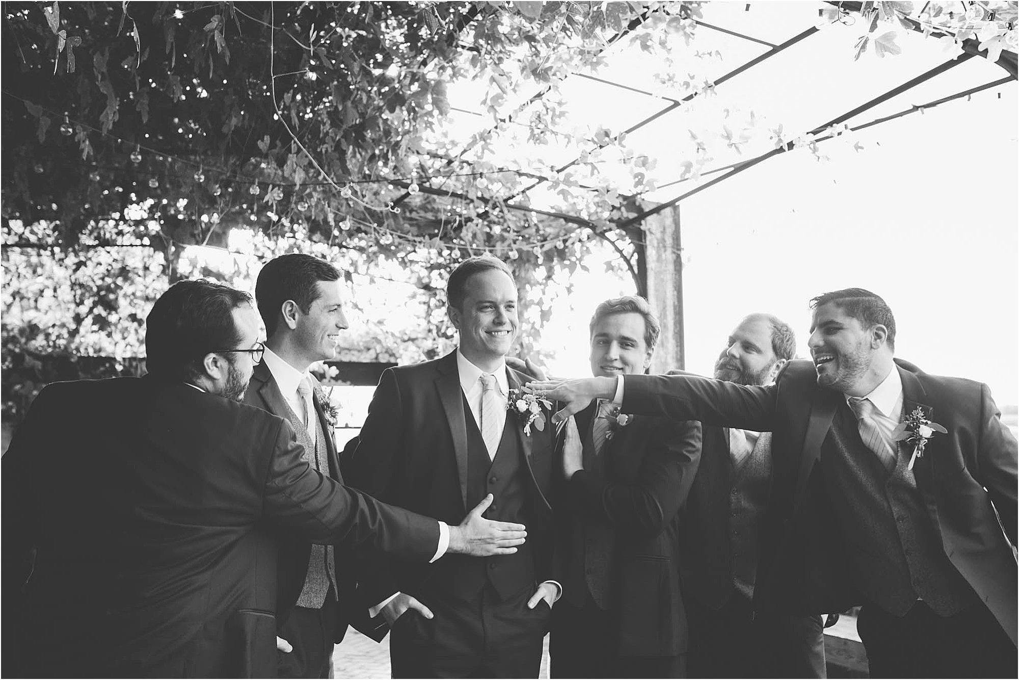 black and white groom and groomsmen photos