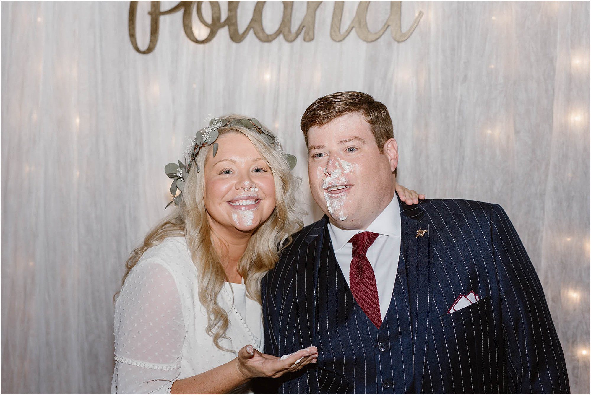 cake smash between bride and groom
