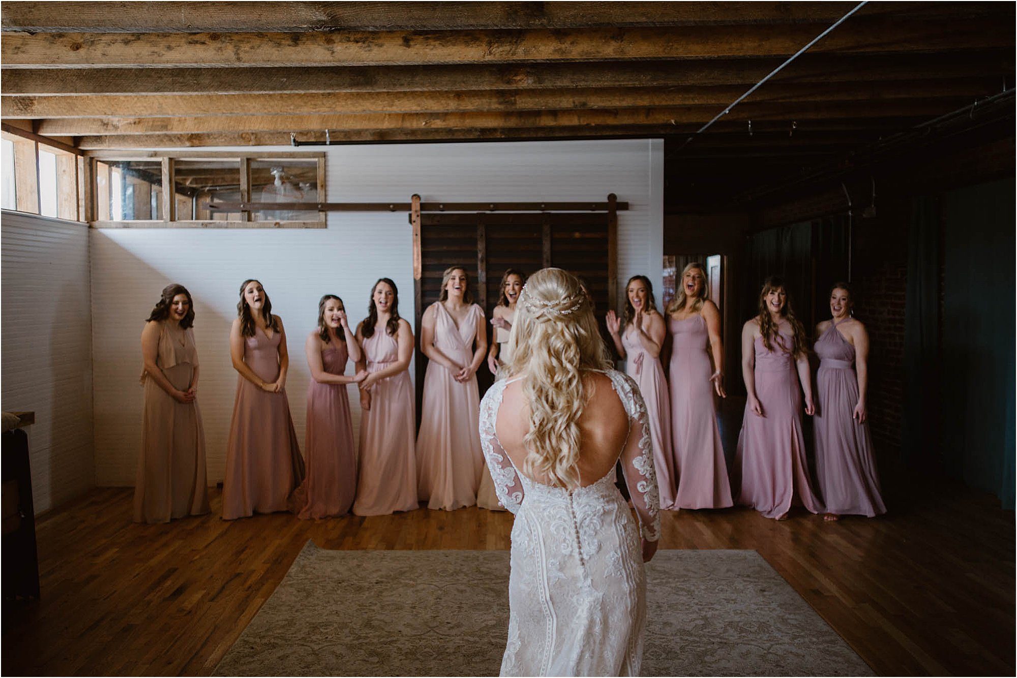 bridesmaids seeing bride for the first time