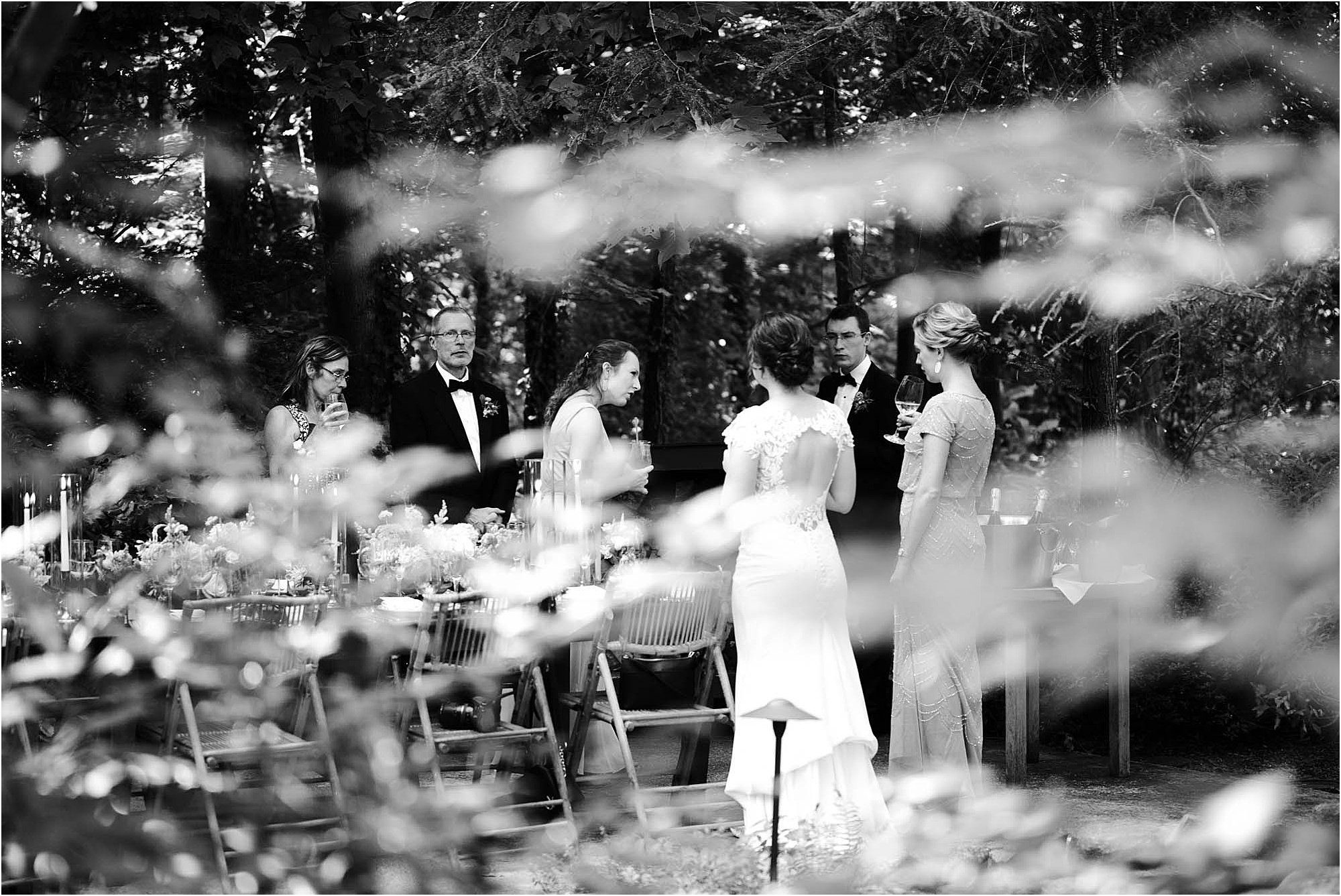guests mingling with bride and groom at wedding