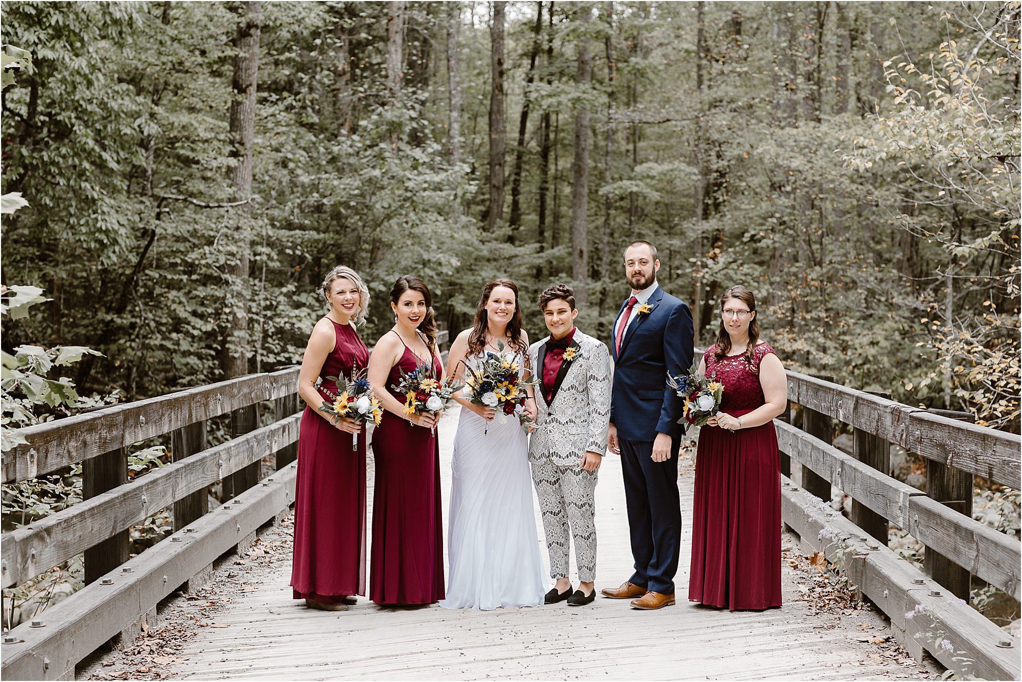bridal party photos on bridge in Greenbrier