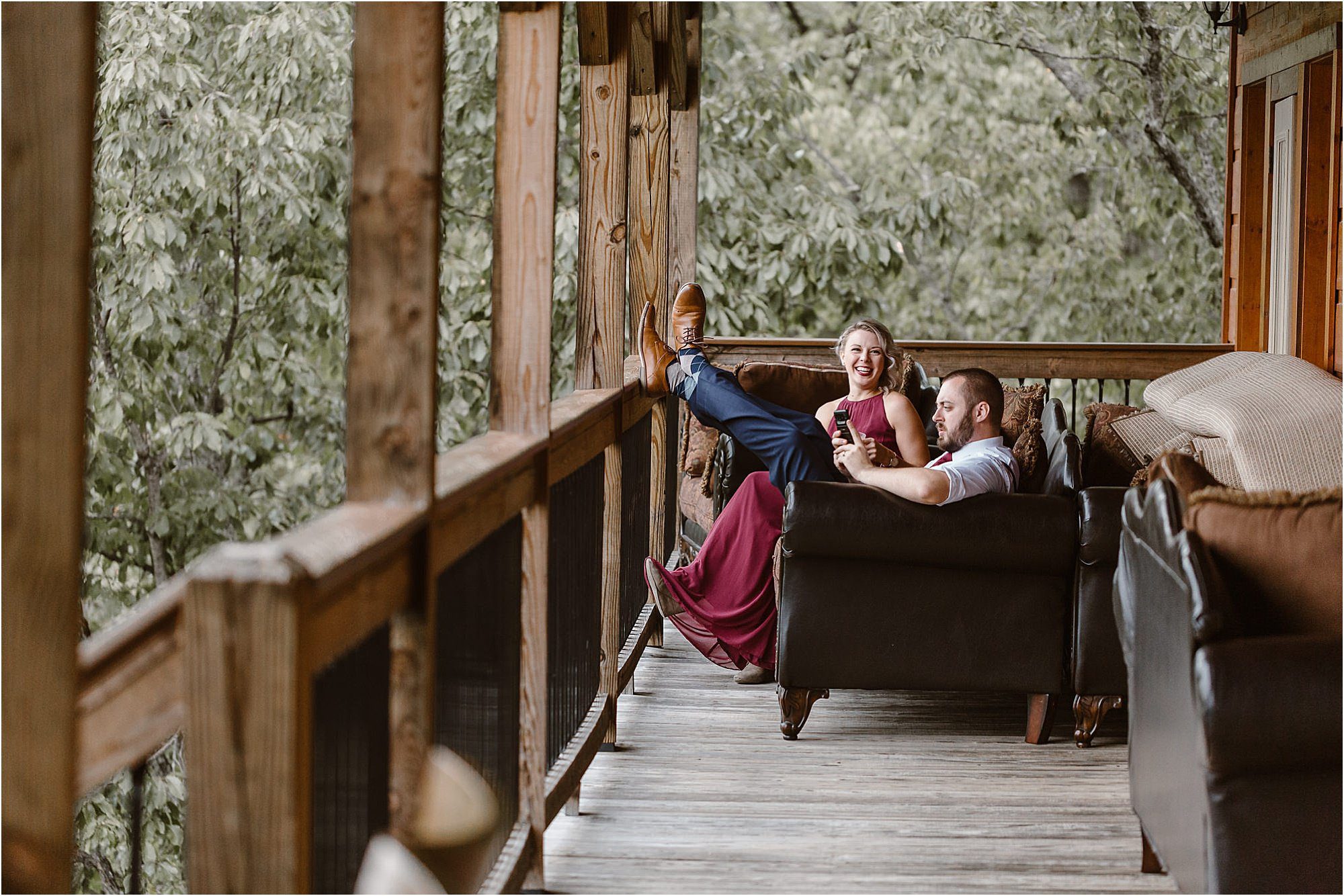 wedding guests lounging on cabin deck in the Smokies