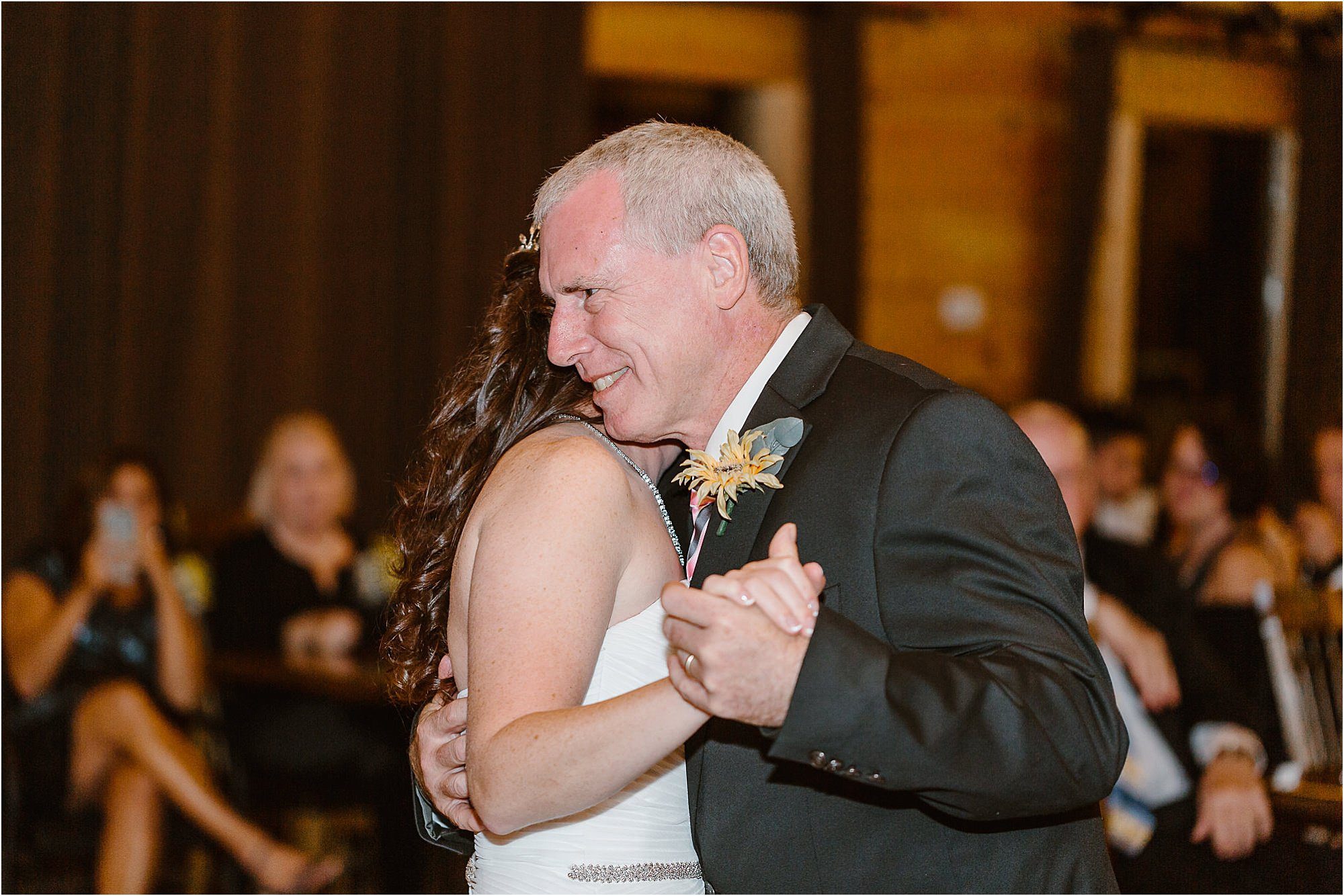 bride dances with dad at wedding