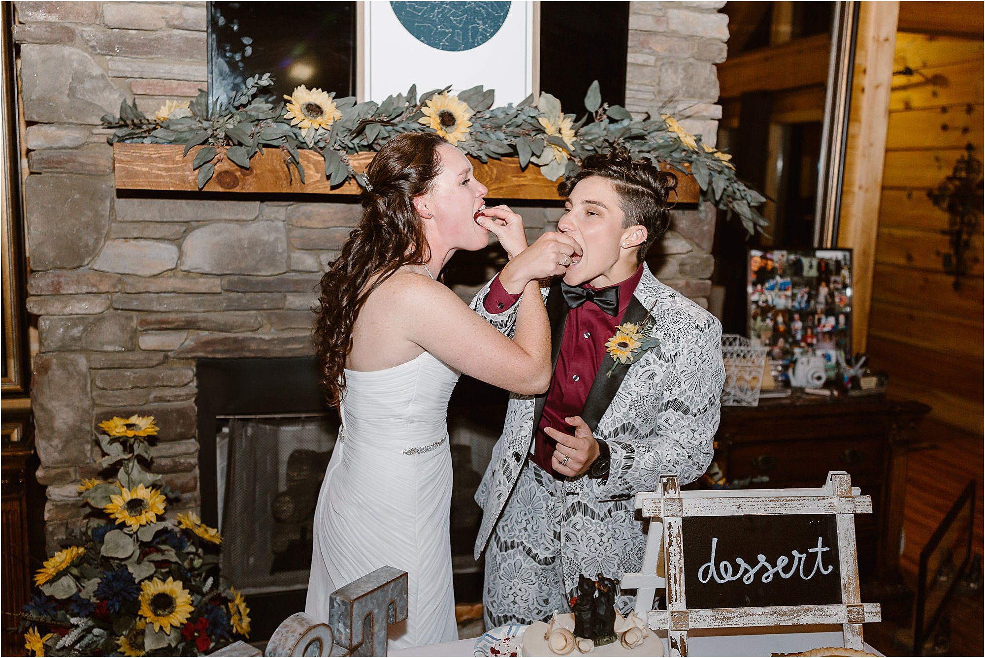 bride and bride cut cake at destination Smoky Mountain Wedding