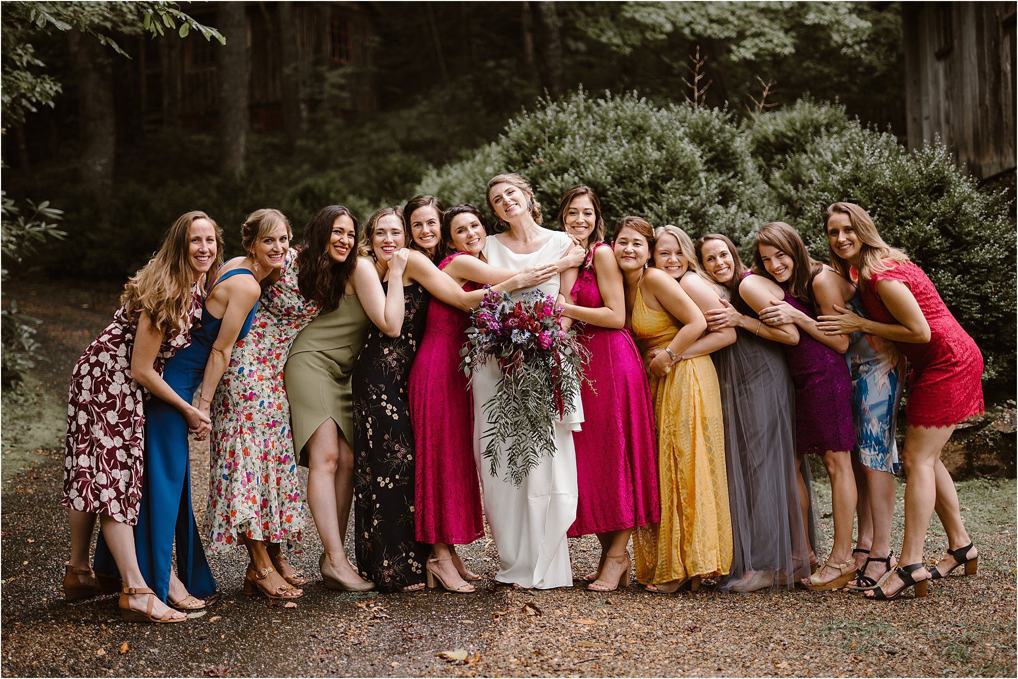 bright and colorful guest dresses at wildflower wedding