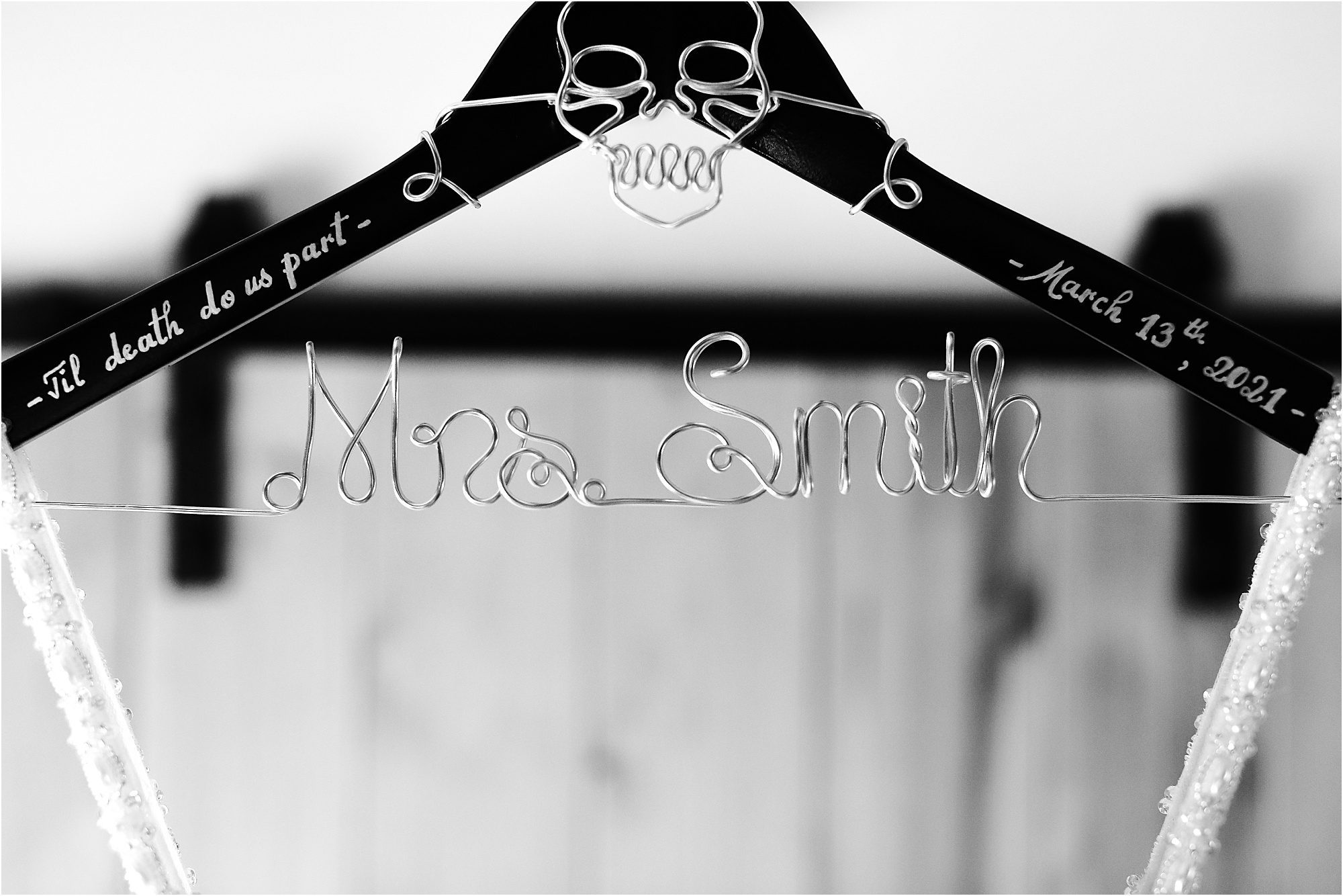 black and white photo of personalized dress wedding hanger