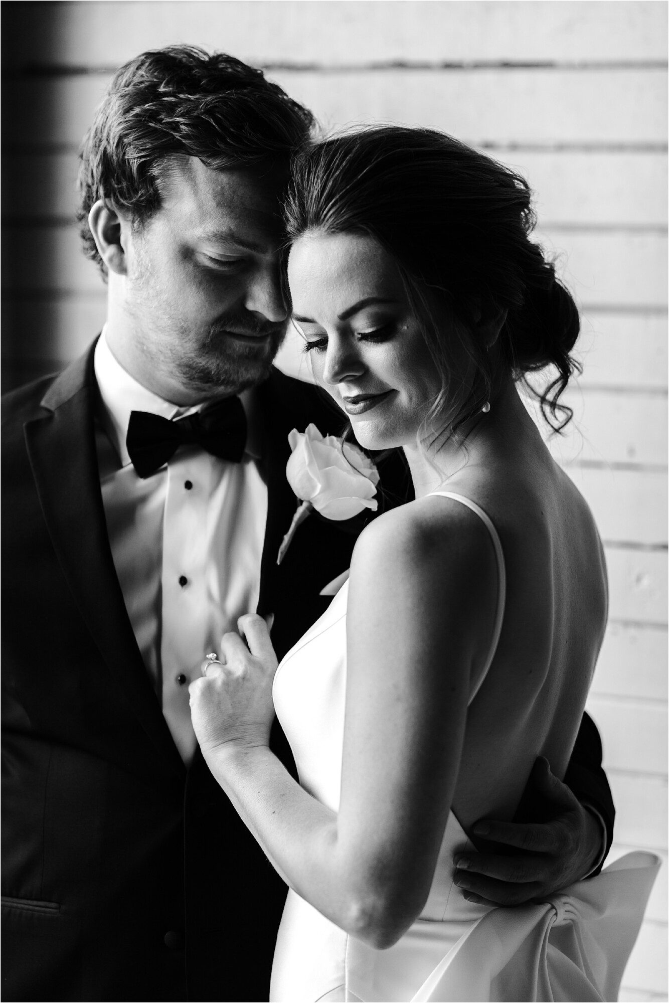 black and white portrait photo of bride and groom