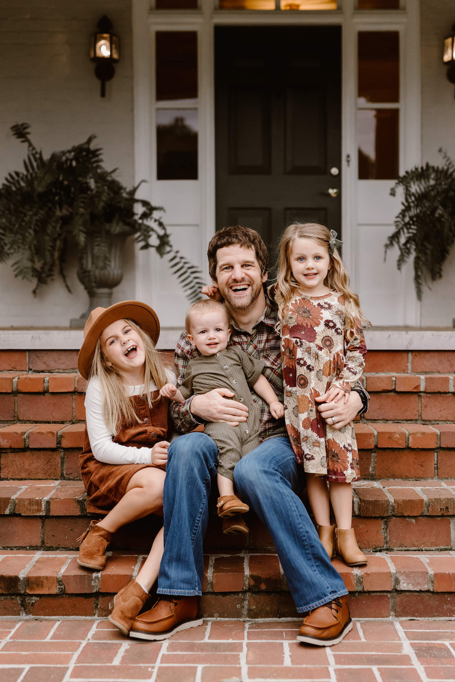 man holding children during Erin Morrison Photography family photography session