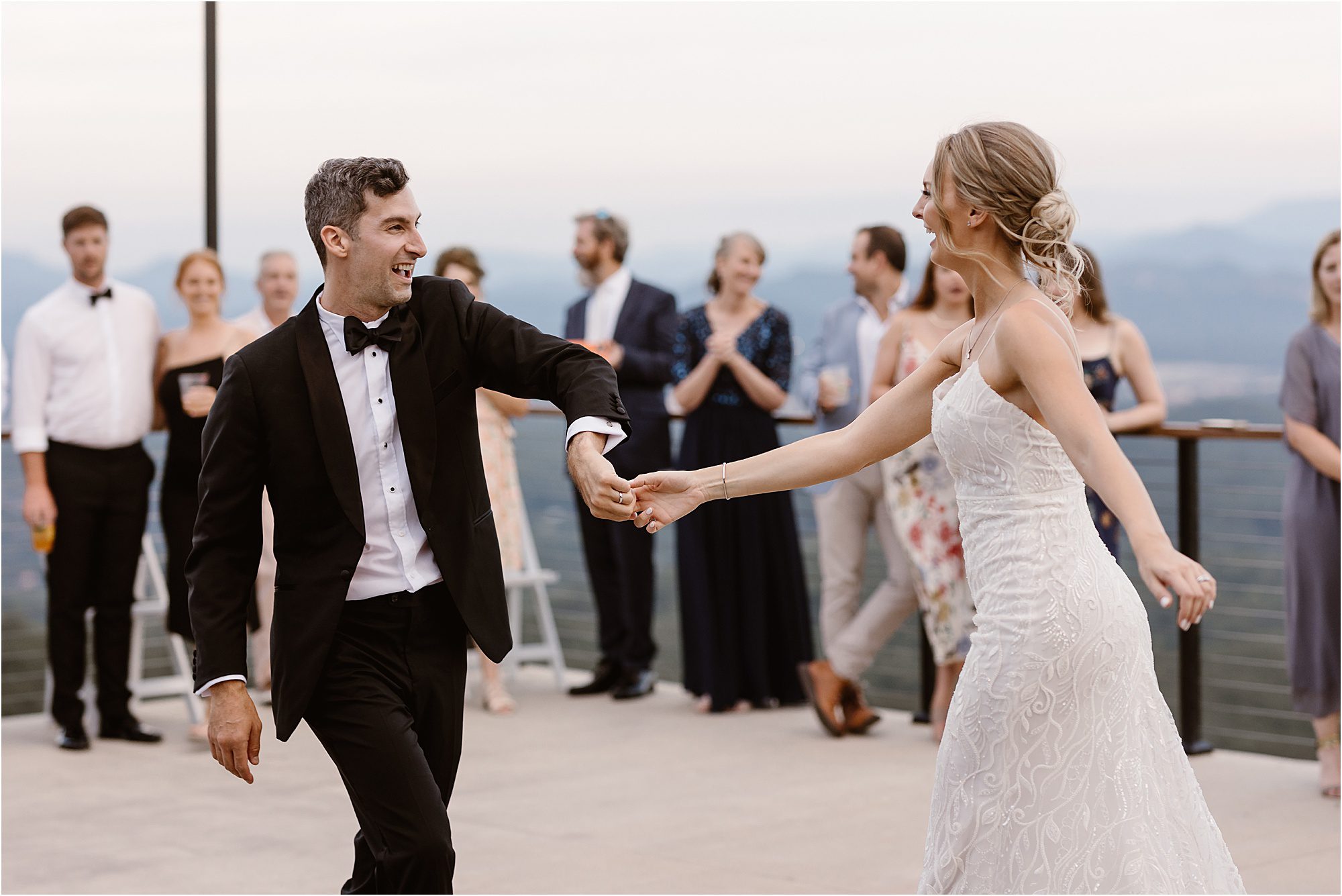 bride and groom dance on dance floor patio