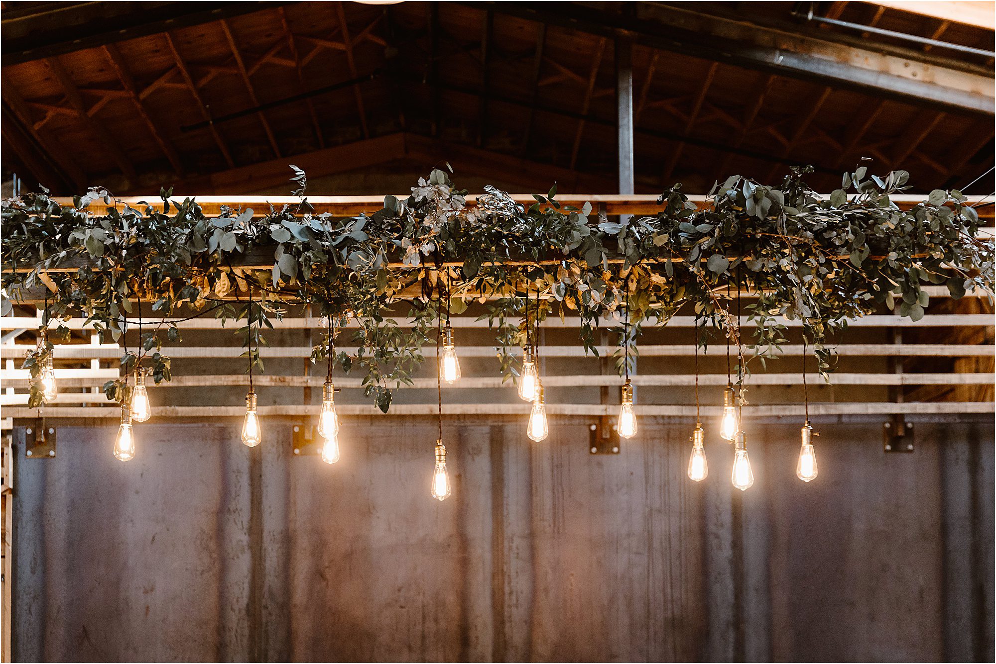 hanging Edison bulbs at wedding in urban loft wedding venue Knoxville