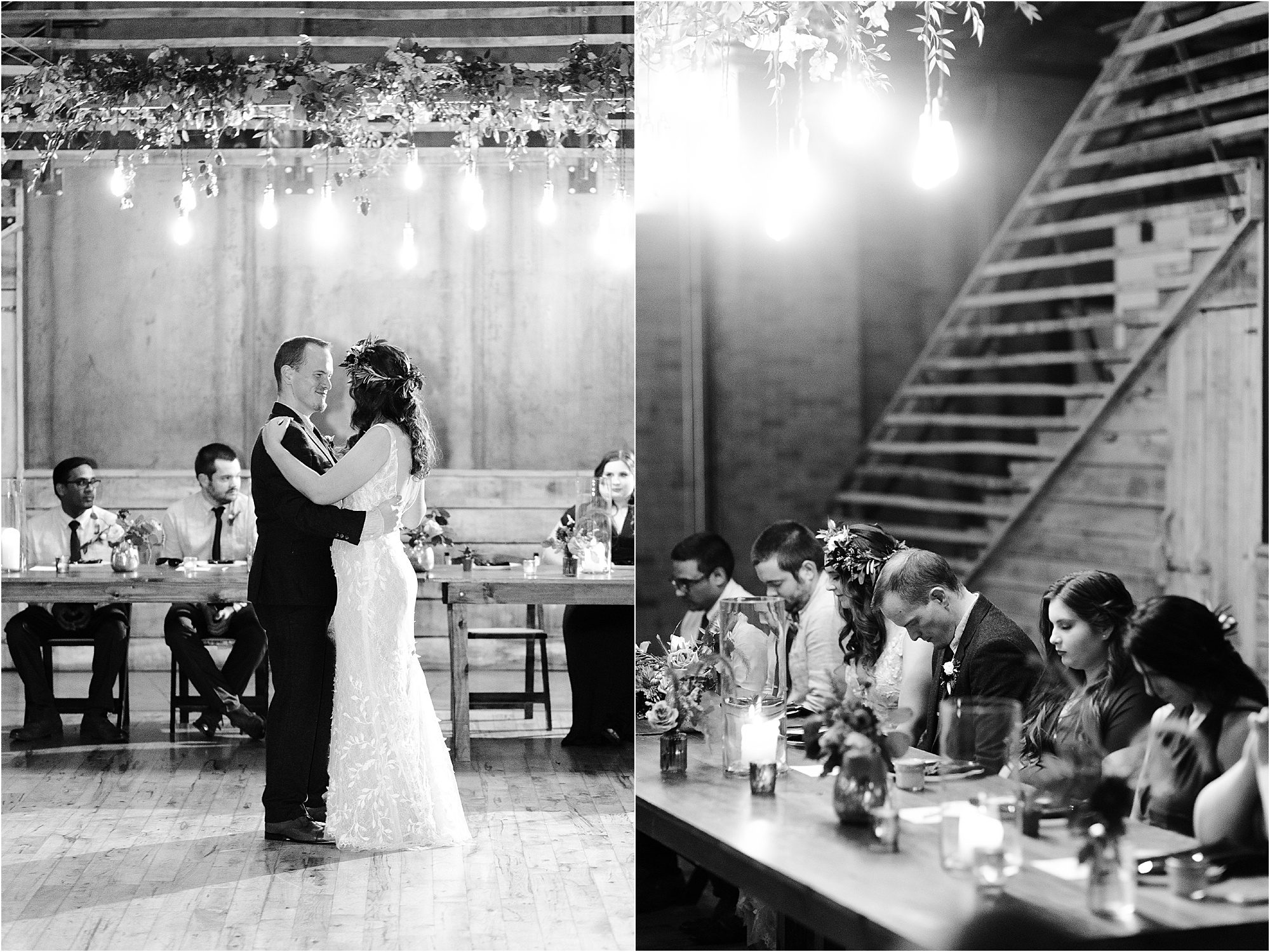 bride and groom dance in black and white photo in front of table adorned with Edison light bulbs