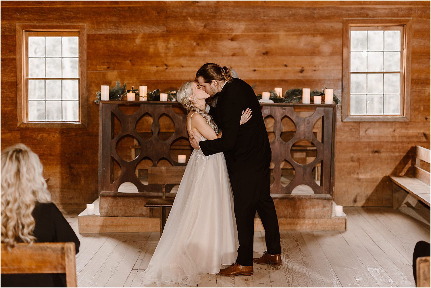 bride and groom kiss at wedding ceremony in Great Smoky Mountains